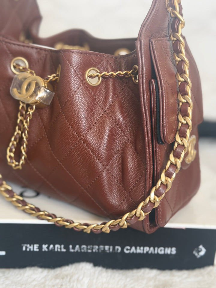 CHANEL 26S Brown Caviar Mini 25 Hobo Bag with Aged GHW 2026