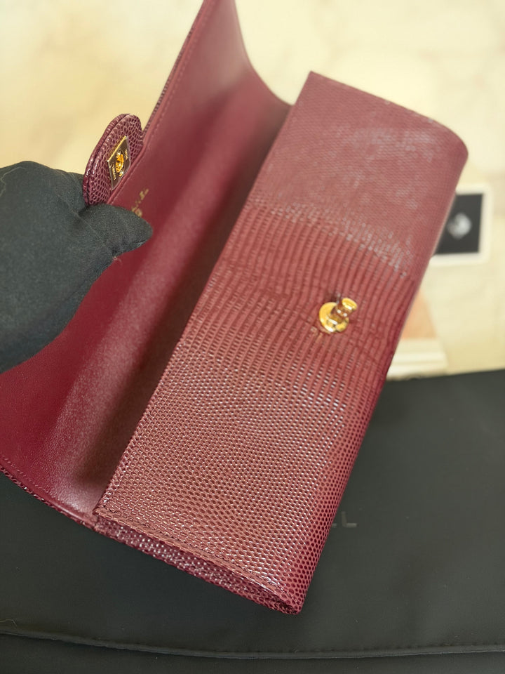 CHANEL 26A Matthieu Blazy Clutch with Top Handle in Burgundy Lizard-Embossed Calfskin with Light Gold Hardware 2026