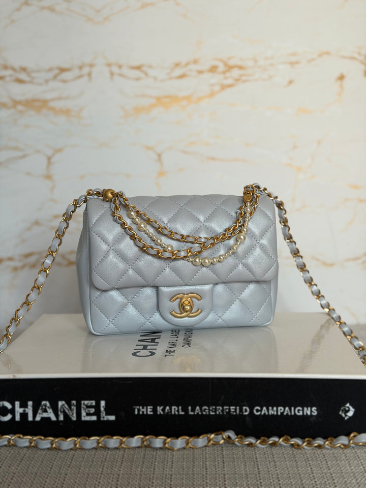 CHANEL Pearl Twist Pearly Light Blue Lambskin Mini Flap Bag 2023