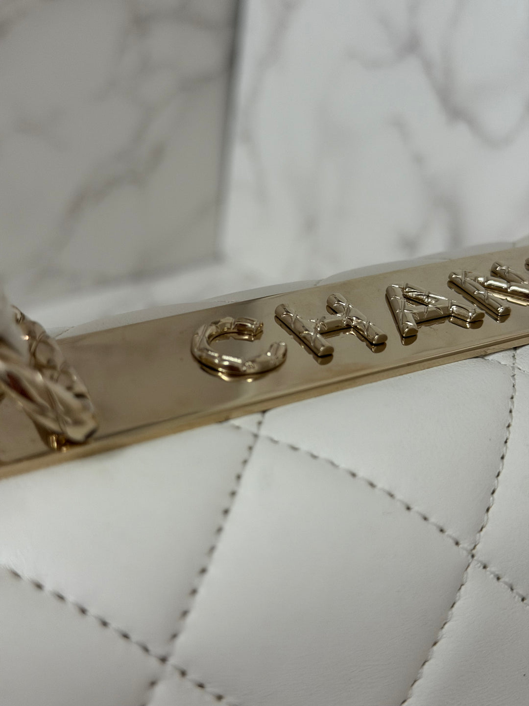 CHANEL 23S collection 2023 White Lambskin LGHW Trendy CC Flap Bag size Small with raised CHANEL Engraved Plate Top Handle