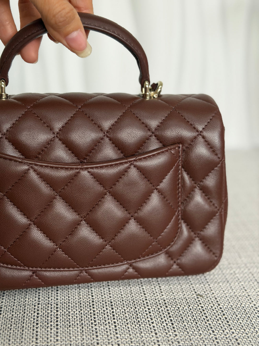 CHANEL 25K collection 2025 Brown Lambskin LGHW Mini Rectangular Flap Bag with Leather Top Handle