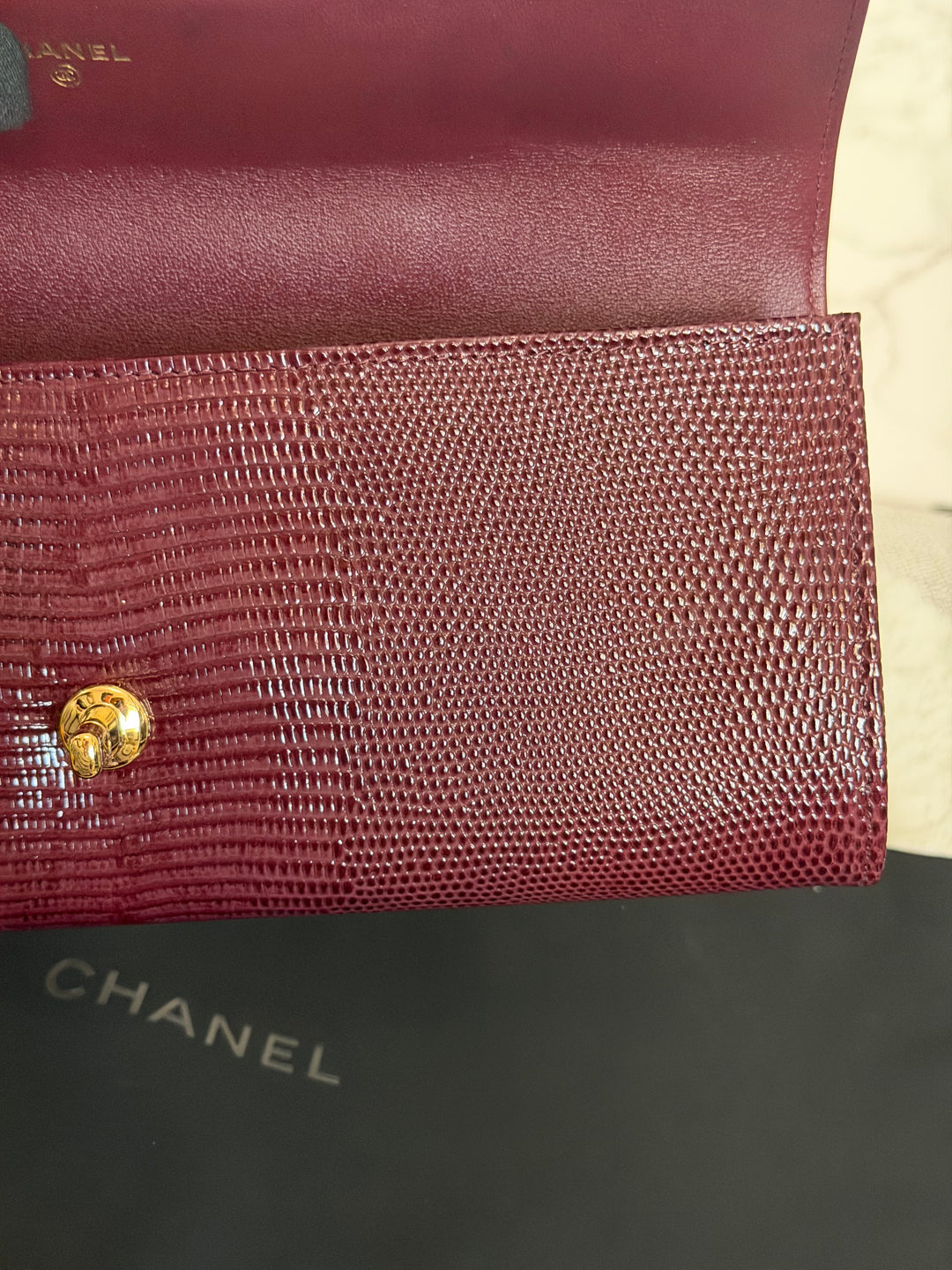 CHANEL 26A Matthieu Blazy Clutch with Top Handle in Burgundy Lizard-Embossed Calfskin with Light Gold Hardware 2026