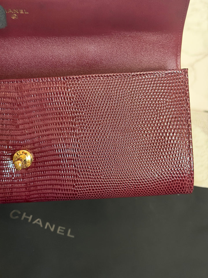 CHANEL 26A Matthieu Blazy Clutch with Top Handle in Burgundy Lizard-Embossed Calfskin with Light Gold Hardware 2026