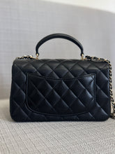 Load image into Gallery viewer, Chanel Black Lambskin Mini Rectangular Flap Bag with Top Handle and Champagne GHW
