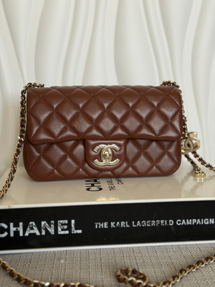 CHANEL 26S Brown Lambskin Adjustable Chain LGHW Mini Rectangular Flap Bag 2026