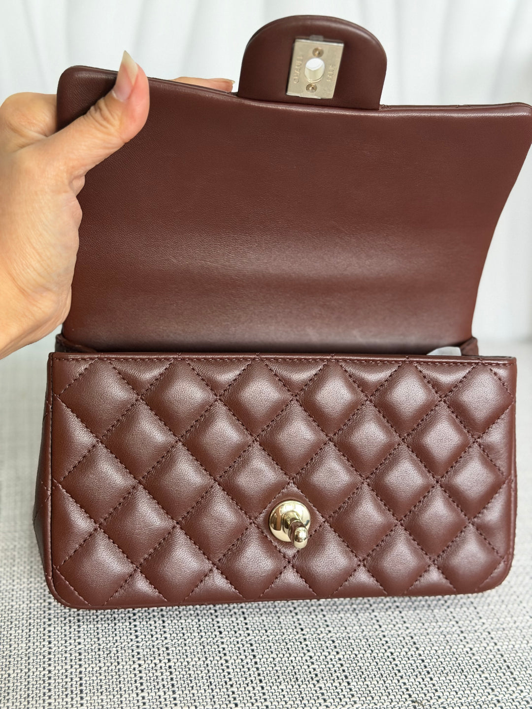 CHANEL 25K collection 2025 Brown Lambskin LGHW Mini Rectangular Flap Bag with Leather Top Handle