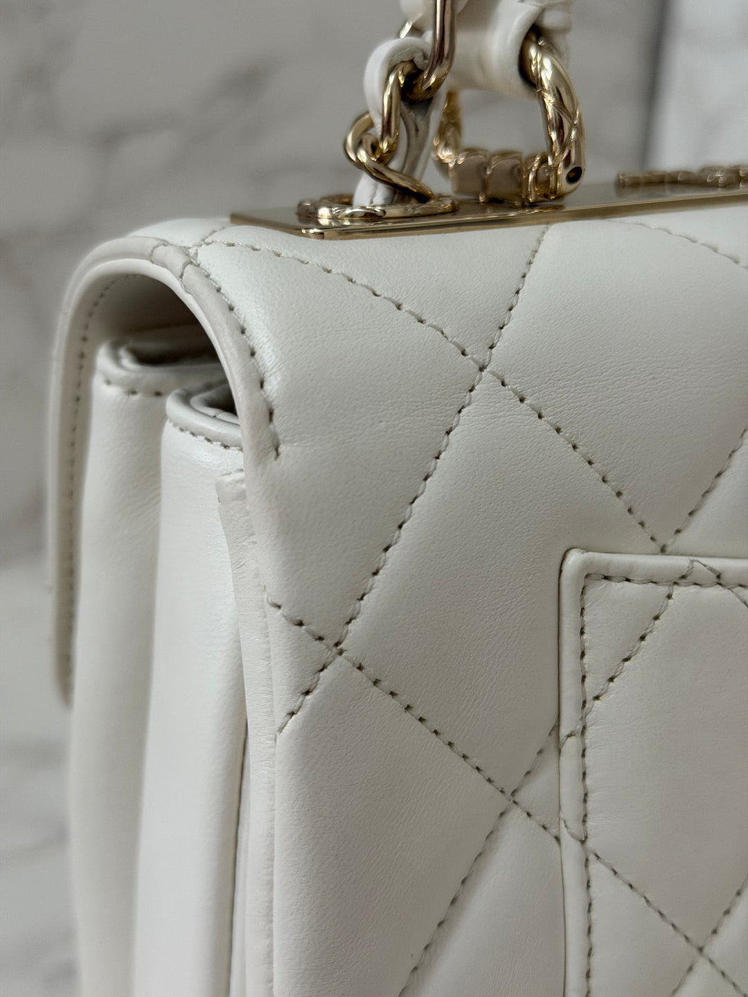 CHANEL 23S collection 2023 White Lambskin LGHW Trendy CC Flap Bag size Small with raised CHANEL Engraved Plate Top Handle