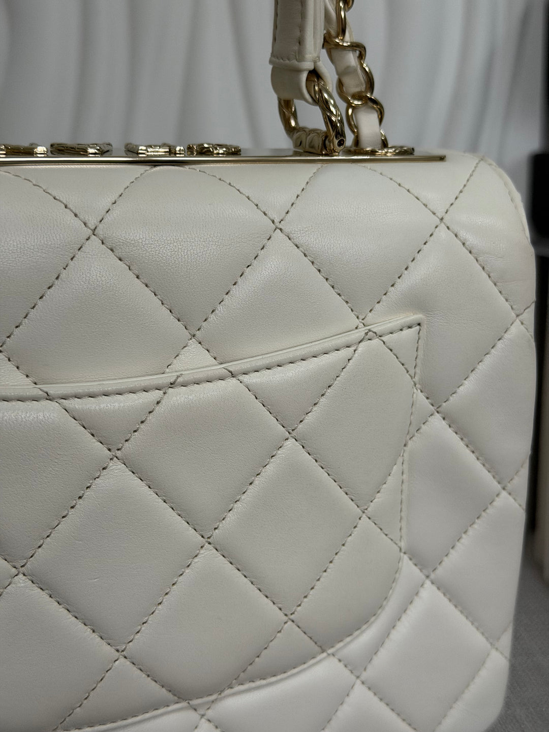 CHANEL 23S collection 2023 White Lambskin LGHW Trendy CC Flap Bag size Small with raised CHANEL Engraved Plate Top Handle