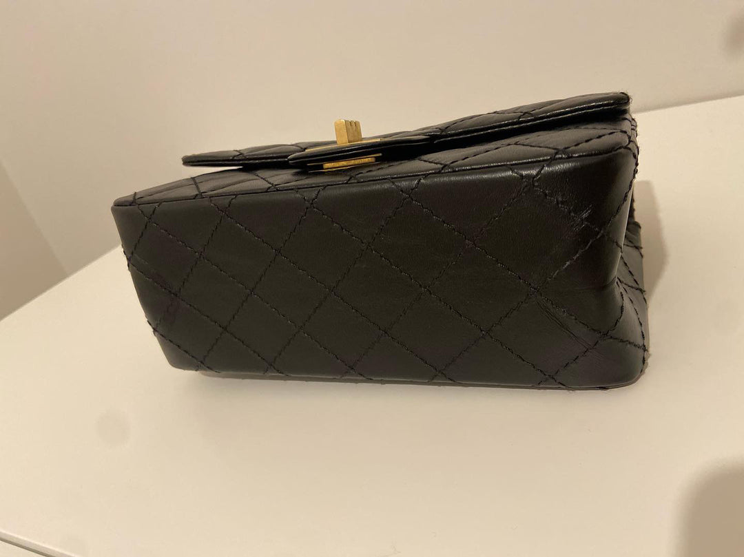 Chanel series 28 (2019) Black Calf skin Aged GHW Mini Reissue Flap Bag