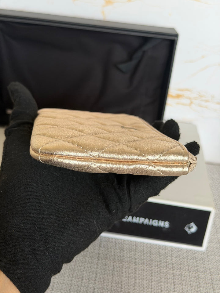 CHANEL 21P Metallic Gold Lambskin LGHW Mini O Case Pouch 15 cms