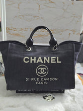 Load image into Gallery viewer, Chanel series 21 2015 Denim Deauville Tote with Leather Handle Size Medium (15 inches)
