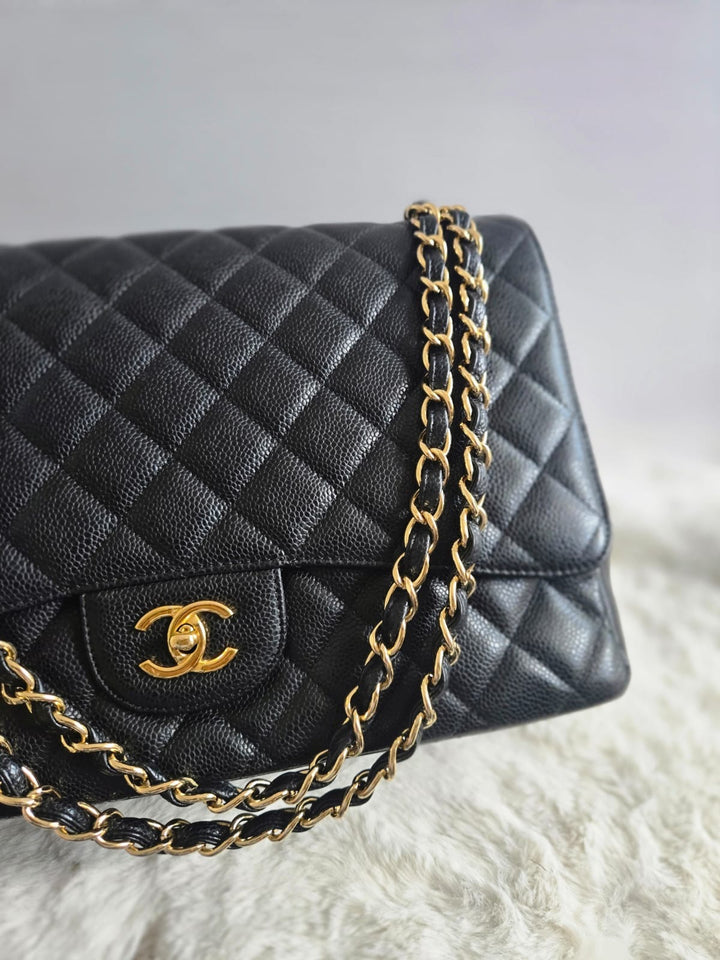 Chanel series 13 2010 Black Caviar Maxi Single Flap Bag with GHW