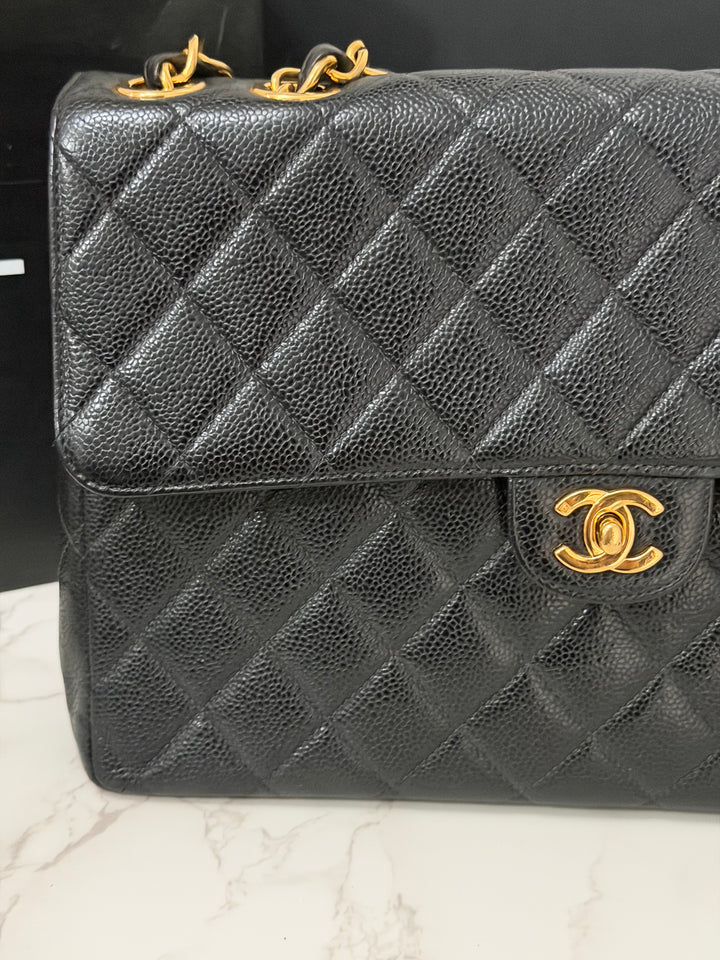 Chanel Series 7 24K GHW Black Caviar Vintage Jumbo Single Flap Bag 2008/2009