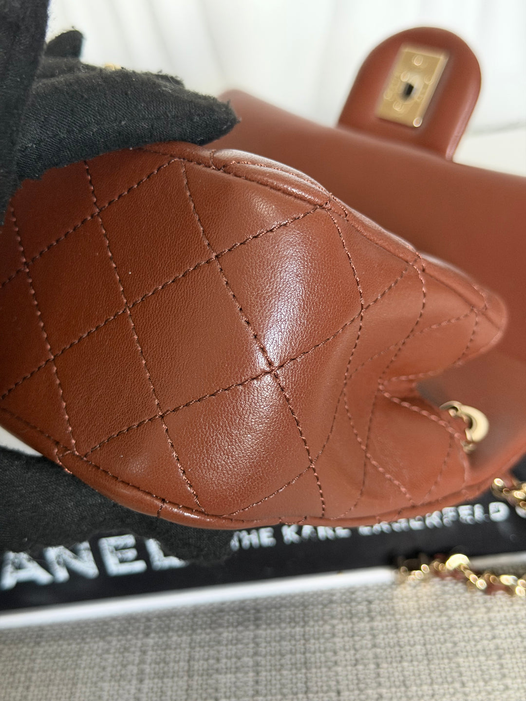 CHANEL 26S Brown Lambskin Adjustable Chain LGHW Mini Rectangular Flap Bag 2026