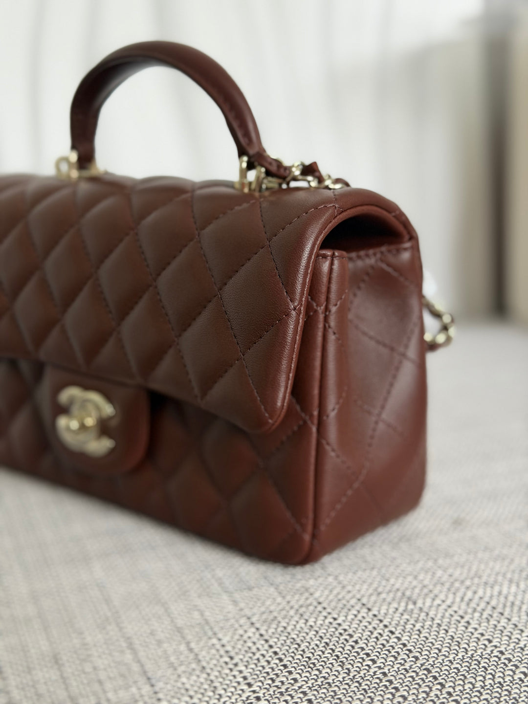 CHANEL 25K collection 2025 Brown Lambskin LGHW Mini Rectangular Flap Bag with Leather Top Handle