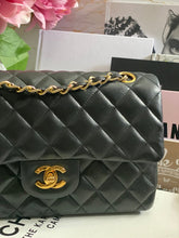 Load image into Gallery viewer, Chanel series 1 (circa 1989-1991) Black Lambskin 24K GHW Small Classic Double Flap Vintage Bag

