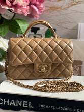 Load image into Gallery viewer, Chanel 22B 2022 Fall/Winter collection Dark Beige Lambskin Top Handle with gold metal plate and antique GHW Mini Rectangular Flap bag
