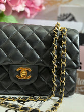 Load image into Gallery viewer, Chanel series 1 (circa 1989-1991) Black Lambskin 24K GHW Small Classic Double Flap Vintage Bag
