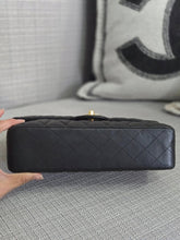 Load image into Gallery viewer, Chanel series 16 2012 Black Lambskin Medium ML Timeless Classic Double Flap Bag with GHW
