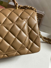 Load image into Gallery viewer, Chanel 22B 2022 Fall/Winter collection Dark Beige Lambskin Top Handle with gold metal plate and antique GHW Mini Rectangular Flap bag
