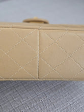 Load image into Gallery viewer, Chanel series 1 Beige Lambskin 24K GHW Vintage Mini Flap Bag
