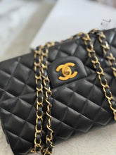 Load image into Gallery viewer, Chanel series 1 (circa 1989-1991) Black Lambskin 24K GHW Small Classic Double Flap Vintage Bag
