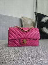 Load image into Gallery viewer, Chanel series 21 Barbie Pink Lambskin Chevron Mini Rectangular Flap Bag with Yellow GHW
