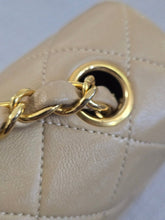 Load image into Gallery viewer, Chanel series 1 Beige Lambskin 24K GHW Vintage Mini Flap Bag
