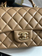 Load image into Gallery viewer, Chanel 22B 2022 Fall/Winter collection Dark Beige Lambskin Top Handle with gold metal plate and antique GHW Mini Rectangular Flap bag
