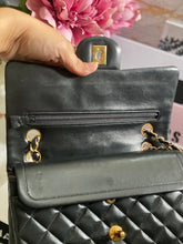 Load image into Gallery viewer, Chanel series 1 (circa 1989-1991) Black Lambskin 24K GHW Small Classic Double Flap Vintage Bag
