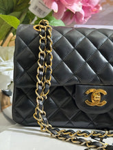 Load image into Gallery viewer, Chanel series 1 (circa 1989-1991) Black Lambskin 24K GHW Small Classic Double Flap Vintage Bag
