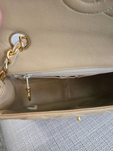 Load image into Gallery viewer, Chanel series 1 Beige Lambskin 24K GHW Vintage Mini Flap Bag
