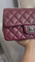 Load and play video in Gallery viewer, Chanel series 28 2019 Burgundy Lambskin Silver HW Mini Rectangular Flap Bag
