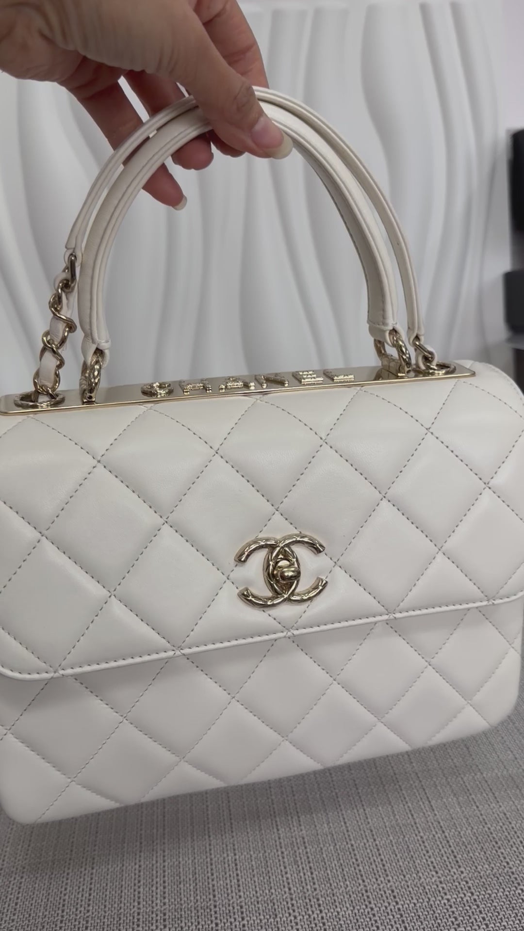 CHANEL 23S collection 2023 White Lambskin LGHW Trendy CC Flap Bag size Small with raised CHANEL Engraved Plate Top Handle