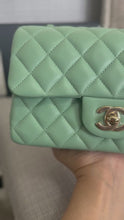 Load and play video in Gallery viewer, Chanel series 31 21C collection 2020/2021 Pastel Mint Green Lambskin Champagne GHW Mini Rectangular Flap Bag
