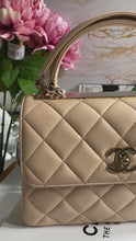 Load and play video in Gallery viewer, Chanel series 31 (2021) 21S Beige Lambskin LGHW Small Trendy CC Flap Bag with non detachable shoulder strap
