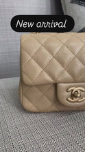 Load and play video in Gallery viewer, Chanel series 20 15C 2014/2015 Cruise Collection Pearly Beige Caviar Brushed GHW Square Mini Flap Bag
