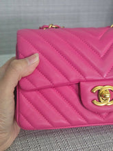 Load image into Gallery viewer, Chanel series 21 Barbie Pink Lambskin Chevron Mini Rectangular Flap Bag with Yellow GHW
