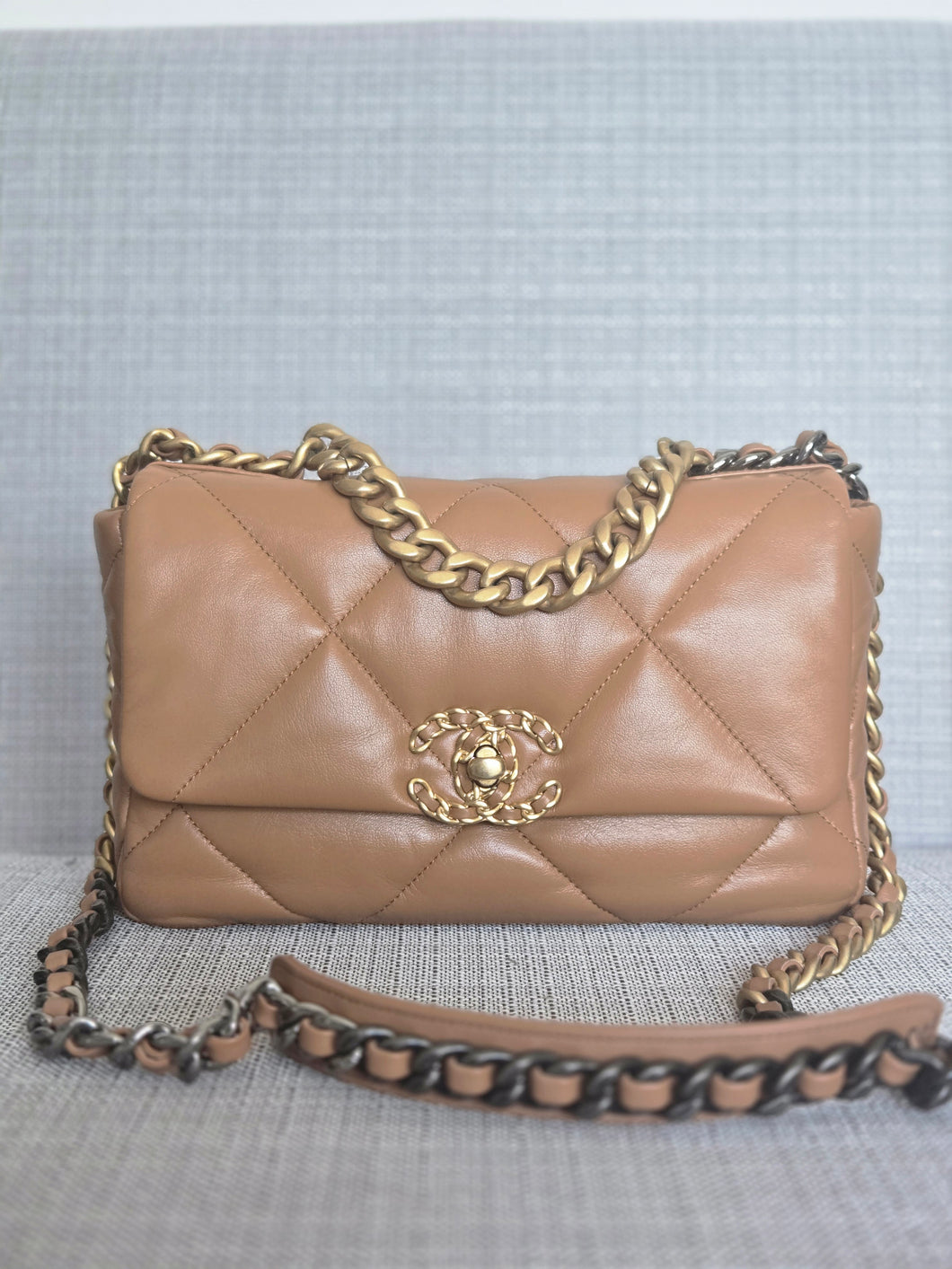 Chanel 19 in 22A/K collection Caramel Brown Lambskin with mixed HW Flap Bag size Small 26 cms