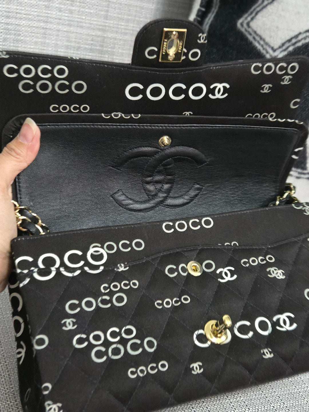 Chanel series 7 2002/2003 Black Canvas Quilted “COCO” Medium Classic Flap Light Gold Hardware