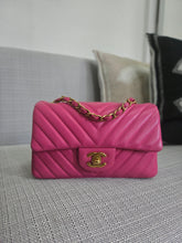 Load image into Gallery viewer, Chanel series 21 2015 Hot Pink Lambskin Chevron Mini Rectangular Flap Bag with Yellow GHW
