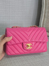 Load image into Gallery viewer, Chanel series 21 2015 Hot Pink Lambskin Chevron Mini Rectangular Flap Bag with Yellow GHW
