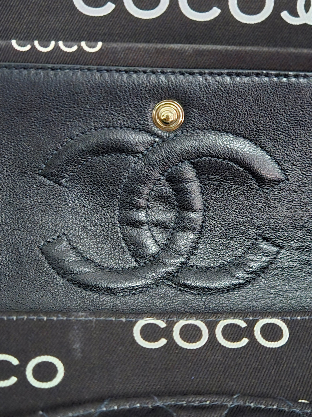 Chanel series 7 2002/2003 Black Canvas Quilted “COCO” Medium Classic Flap Light Gold Hardware