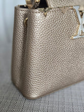 Load image into Gallery viewer, LOUIS VUITTON LV Metallic Taurillon Embellished Flower Crown Mini Capucines in Gold
