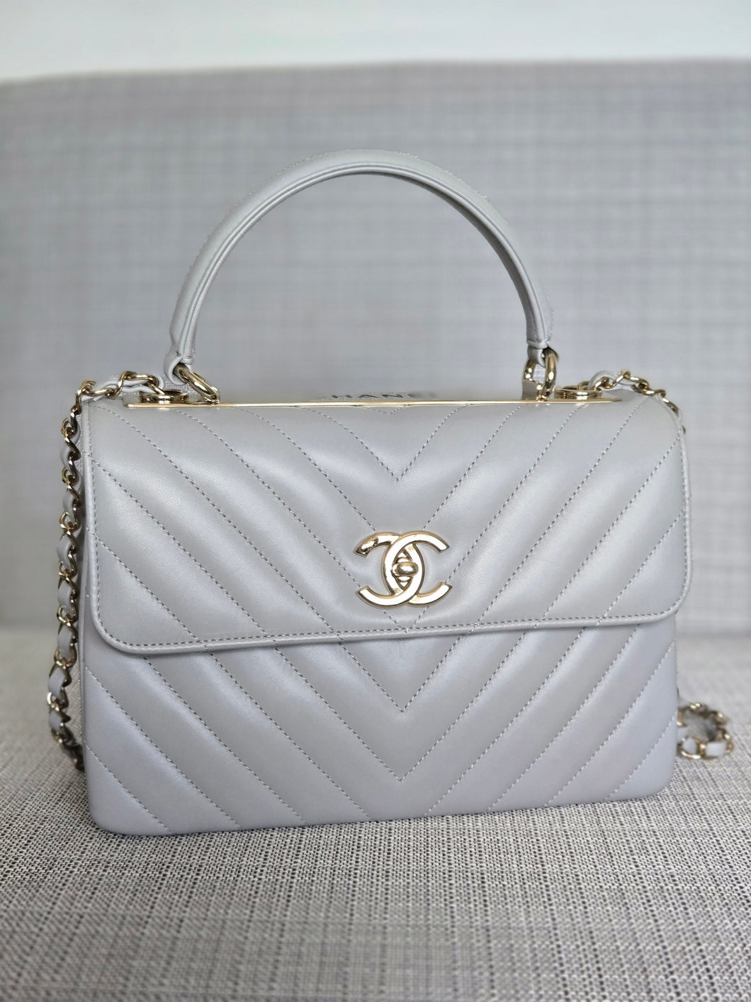 Chanel series 25 Grey Lambskin Chevron Trendy CC Top Handle Flap Bag Size Small with Champagne GHW and Detachable Shoulder strap