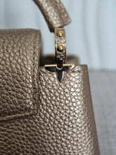 Load image into Gallery viewer, LOUIS VUITTON LV Metallic Taurillon Embellished Flower Crown Mini Capucines in Gold
