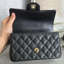 Load image into Gallery viewer, Chanel Black Lambskin Top Handle Mini Rectangular Flap Bag with Champagne GHW
