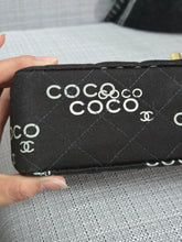 Load image into Gallery viewer, Chanel series 7 2002/2003 Black Canvas Quilted “COCO” Medium Classic Flap Light Gold Hardware
