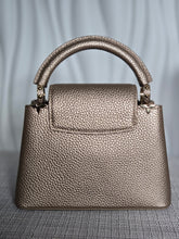 Load image into Gallery viewer, LOUIS VUITTON LV Metallic Taurillon Embellished Flower Crown Mini Capucines in Gold
