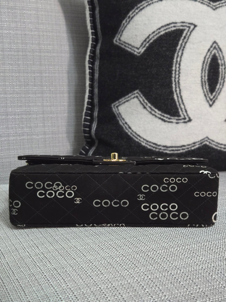 Chanel series 7 2002/2003 Black Canvas Quilted “COCO” Medium Classic Flap Light Gold Hardware